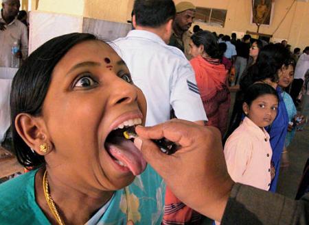 Funny story: Vaishnava feeding atheist with prasadam!